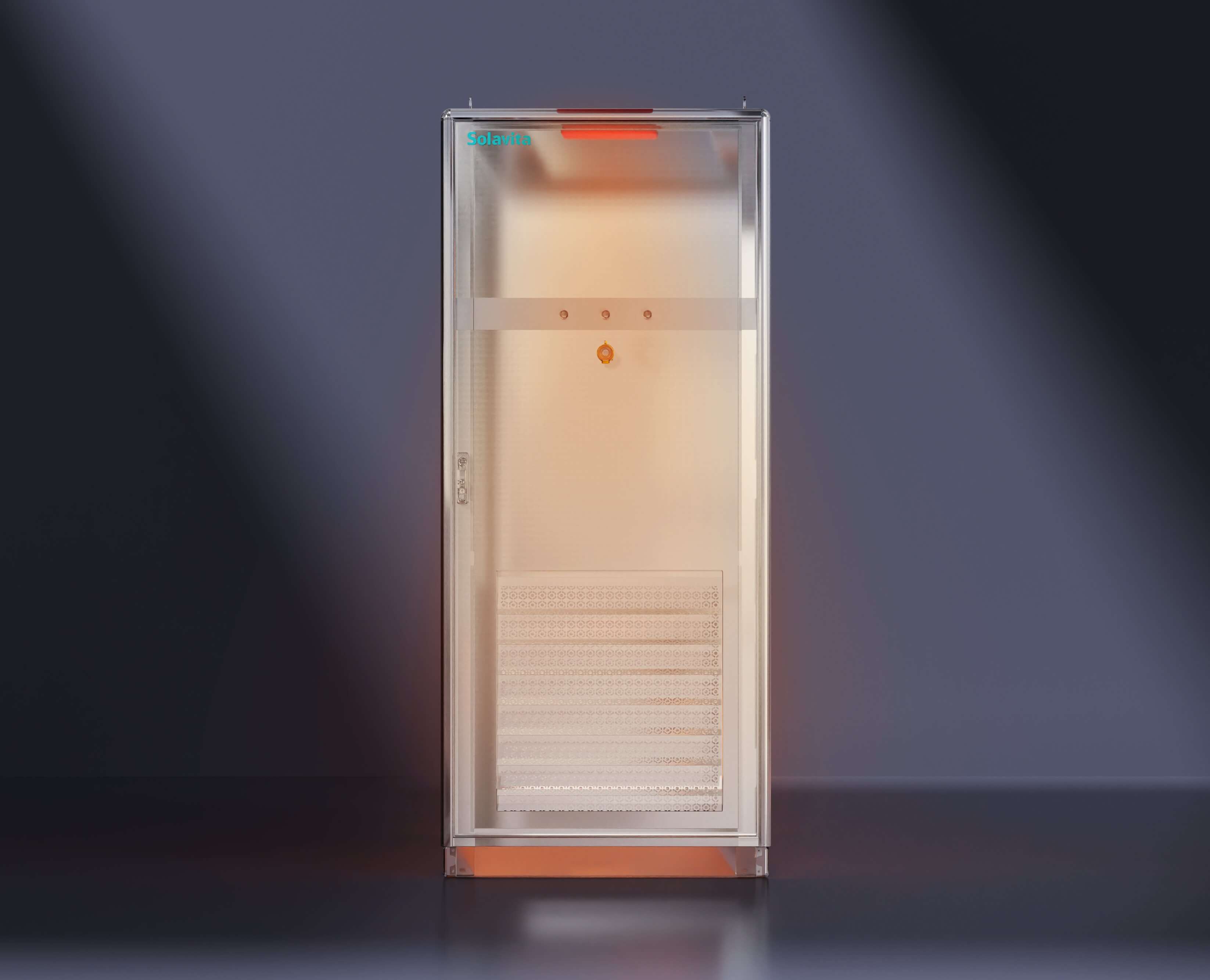 Industrial Solavita power cabinet with internal lighting and transparent enclosure, illuminated with orange glow for thermal control or status indication