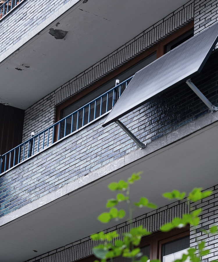 Solavita balcony solar panels mounted on residential building, showcasing compact urban solar energy solution